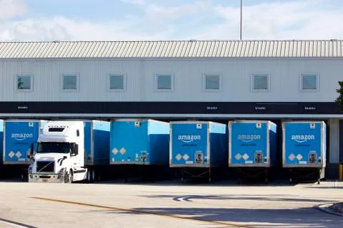 Amazon trailers at cargo terminal Stock Photos