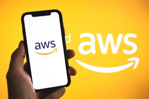 Amazon Web Services logo on the smartphone screen. 스톡 사진