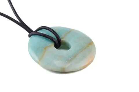 Amazonite donut on leather string 库存照片