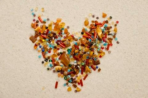 Amber and beads heart Stock Photos
