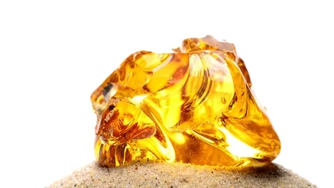 Amber big piece on turn table Stock Footage 120925171