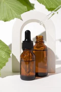 Amber glass bottles Stock Photos