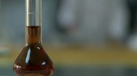 Amber lab flask L Stock Footage 25566098