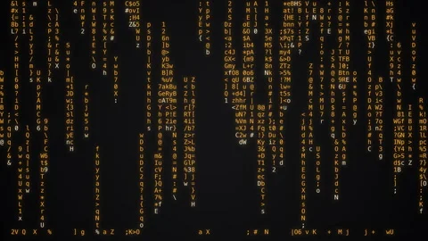 Amber matrix code rain with falling glyphs digits letters and symbols on dark 库存影片 335185428