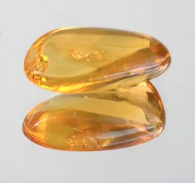 Amber yellow translucent Stock Photos