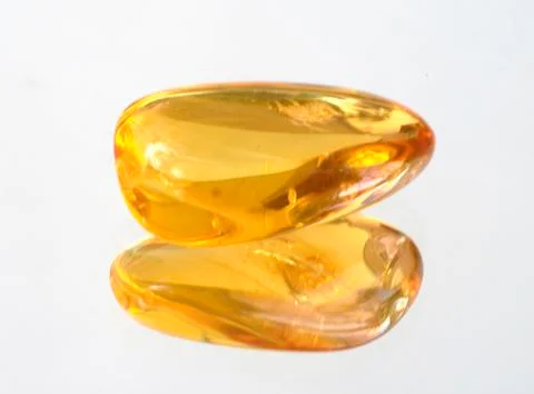 Amber yellow translucent Stock Photos