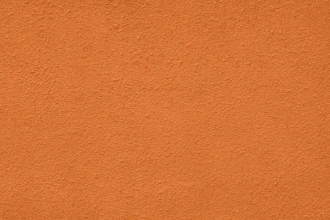 Amberglow rough plaster wall texture Stock Photos