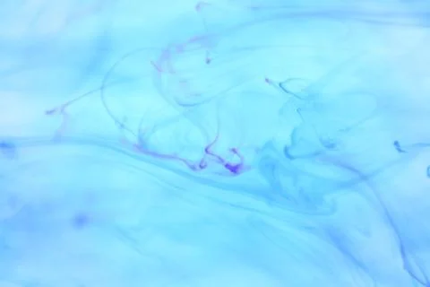 Ambient Ink Drops Dynamic Motion. Soft Background. Stock Photos