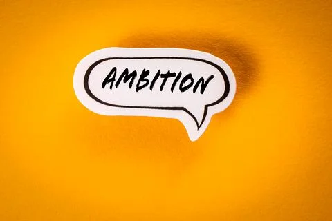 Ambition. Text on white speech bubble. yellow background Stock Photos