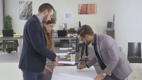 Ambitious co-workers creating a strategy for their small business Stock Footage 73993128