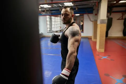 Ambitious man developing his fighting skills Stock Photos