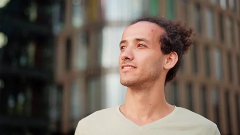 Ambitious young man thinking or day dreaming of future achievements Stock Footage 158070888