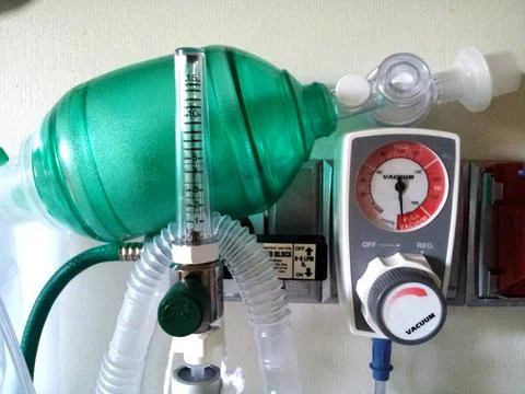 Ambu bag and oxygen flow meters with tubing Stock Photos