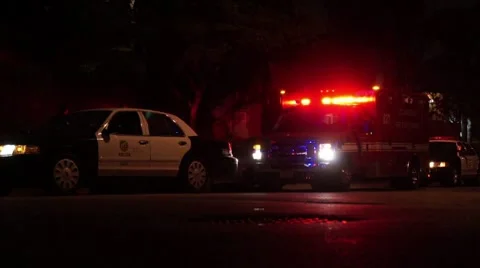 Ambulance and Police Cars at Night HD Stock Footage