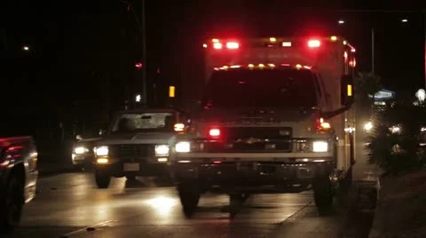 Ambulance breaking through in traffic Stock Footage 12533728