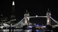 Ambulance Car Passing Tower Bridge Illuminated London Shard Thames River Night HD Footage