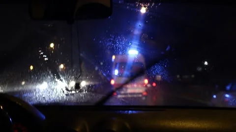 Ambulance Chasing at Night in Rain Stock Footage