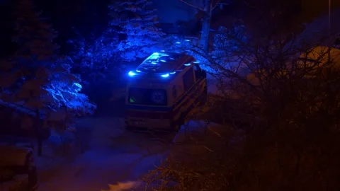 Ambulance on a cold winter night view from the window Stock Footage 263619798
