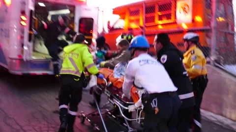 Ambulance crews performing CPR and pulling stretcher in ambulance Stock Footage 48667347