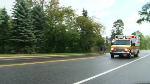 Ambulance Drive By During Marathon Video stock 10925410
