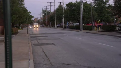 Ambulance driving down the road with lights on Stock Footage 140995931
