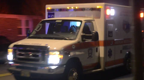 Ambulance Driving By Transporting A Patient To The Hospital Stock Footage