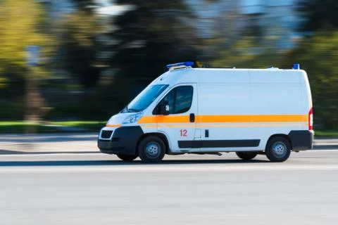 Ambulance on emergency call in motion blur Stock Photos