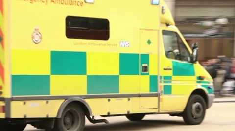 Ambulance with flashing lights, london Stock Footage