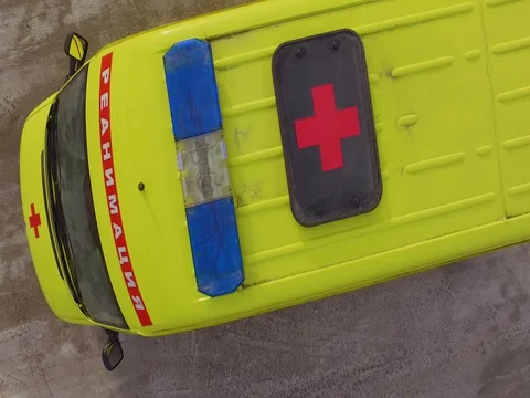 Ambulance going on call.Quadrocopter. The view from the top Stock Footage 83121674