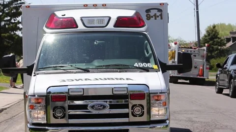 Ambulance with light flashing Stock Footage 64220468