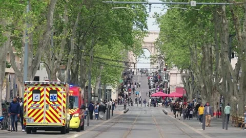 Ambulance Lights Flash on Busy Marseille Boulevard, Porte d'Aix Stock Footage 332484476