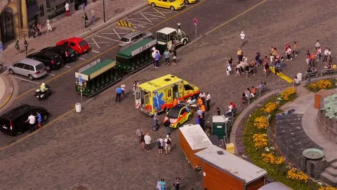 Ambulance loading patient at Old Town Square in Prague Stock Footage 82702487