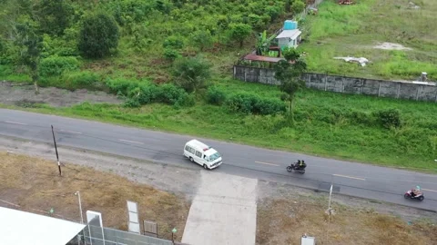 Ambulance passing on the highway Stock Footage 219599593