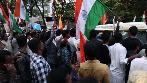 Ambulance-passing-through-crowded-protesters-11 Stock Footage 122306379