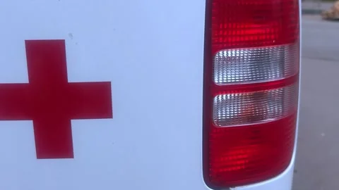 Ambulance with a red cross close-up. Part of the car. First aid. Medical concept Video stock 292149993