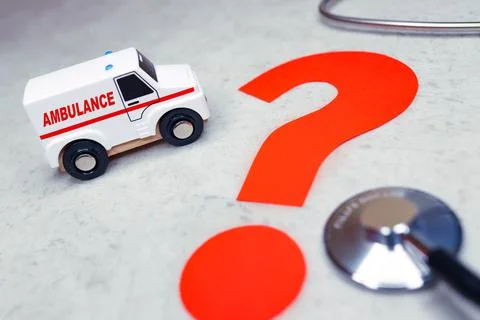 An ambulance with red question mark. Stock Photos