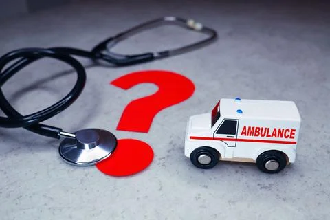 An ambulance with red question mark. Stock Photos