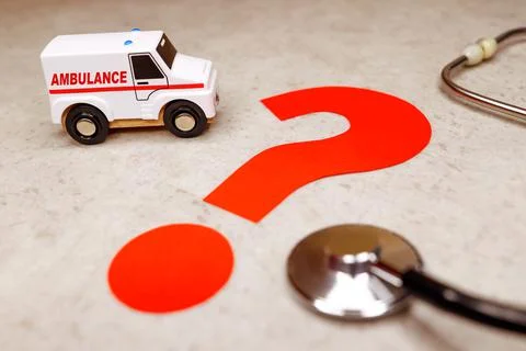 An ambulance with red question mark. Stock Photos
