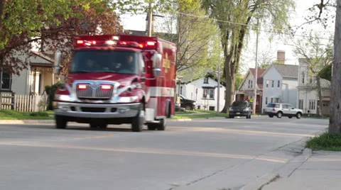 Ambulance Responding in Town Video stock 25873753