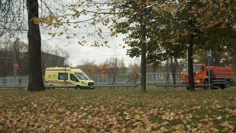 Ambulance rides on the road Stock Footage 117876296