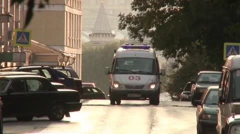 Ambulance on a road Stock Footage 52790430