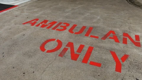 Ambulance road surface sign at public hospital. Stock Footage 87641237