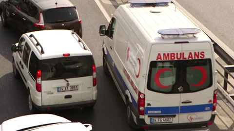 Ambulance in traffic Stock Footage 36910843