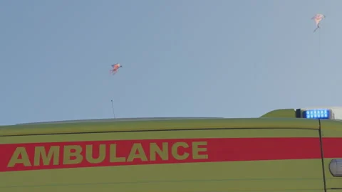 Ambulance under bright sky. Crisp detail of ambulance ready for emergency Stock Footage 333984114