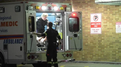 Ambulance Unloading Patient Stock Footage 60635721