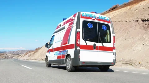 Ambulance van speeding on the highway responding to an emergence situation, a Video stock 237065219