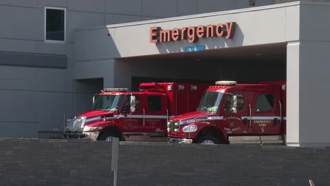 Ambulances parked at Emergency Room Stock Footage 252093687