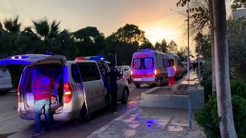 Ambulances Waiting for Wounded co Stock Footage 120941376
