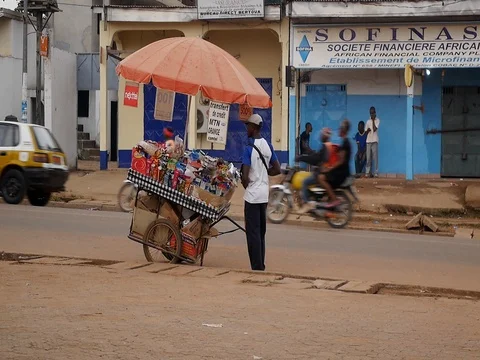 Ambulant vendor in Bertoua Stock Footage 80566135
