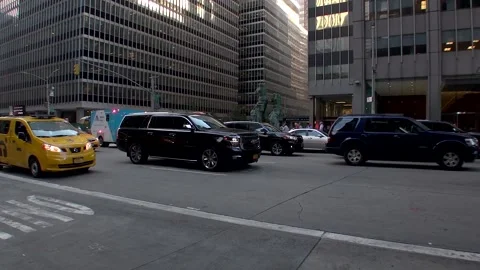 An Ambulence is racing through traffic on 6th Ave Manhattan, Stock Footage 134732391